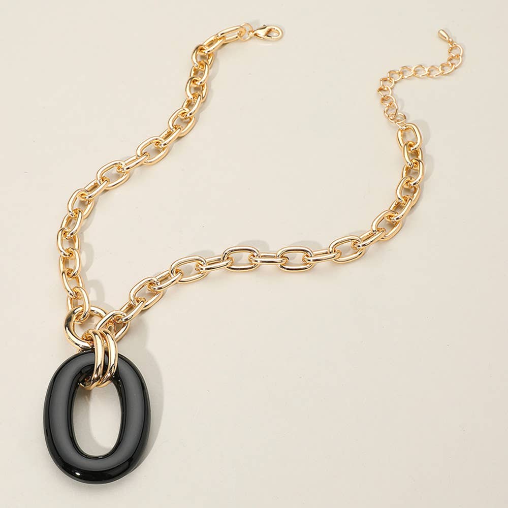 Celeste Celluloid Acetate Oval Ring Pendant Necklace by Sensibling Corp. featuring a sleek oval pendant on a delicate chain.