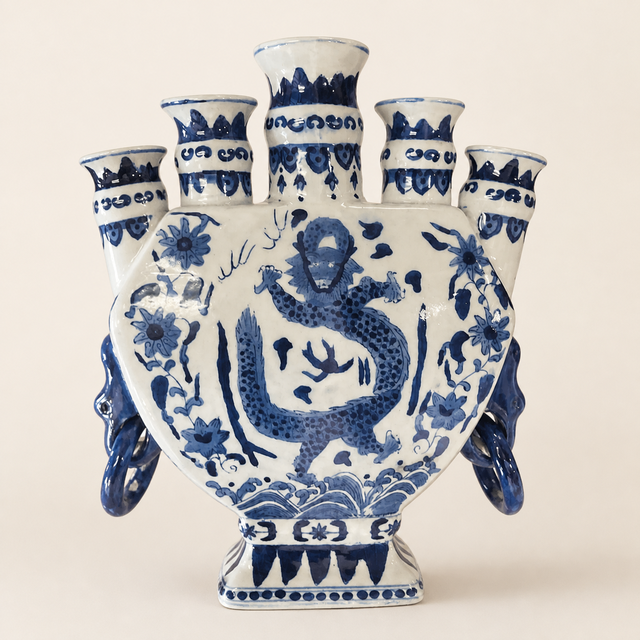 5-Spout Dragon Vase in blue and white on an ivory studio background