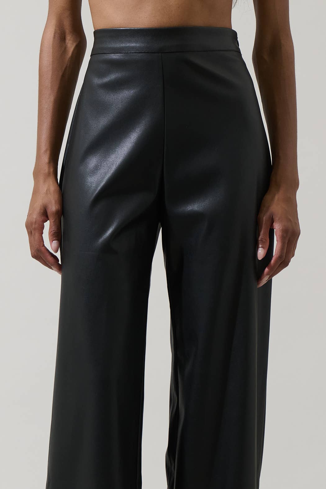 Black Anisa Leather Bern Wide-Leg Pants by Sugarlips, stylish bottoms with a wide-leg design and sleek leather finish.