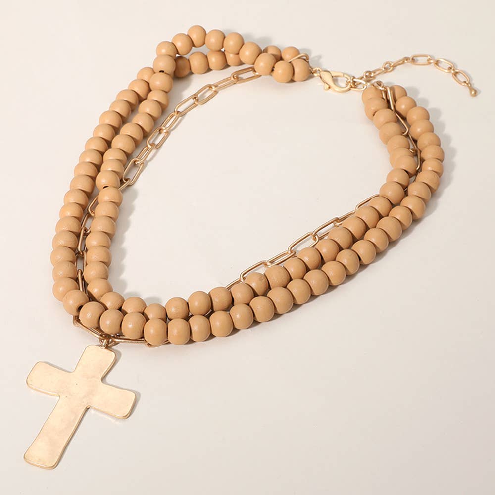 Maribelle hammered metal cross pendant on wood bead necklace, jewelry piece with rustic design, by Sensibling Corp.