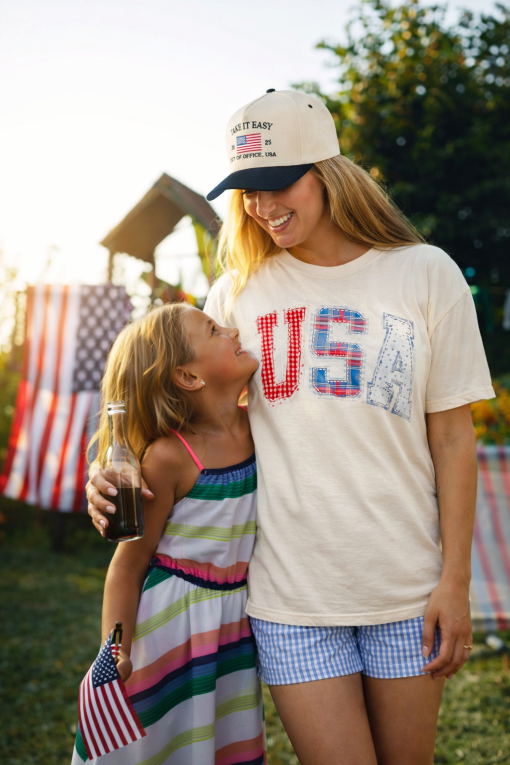 Poppy & Pine Patchwork USA graphic tee showing a colorful patchwork design on a casual cotton T-shirt.