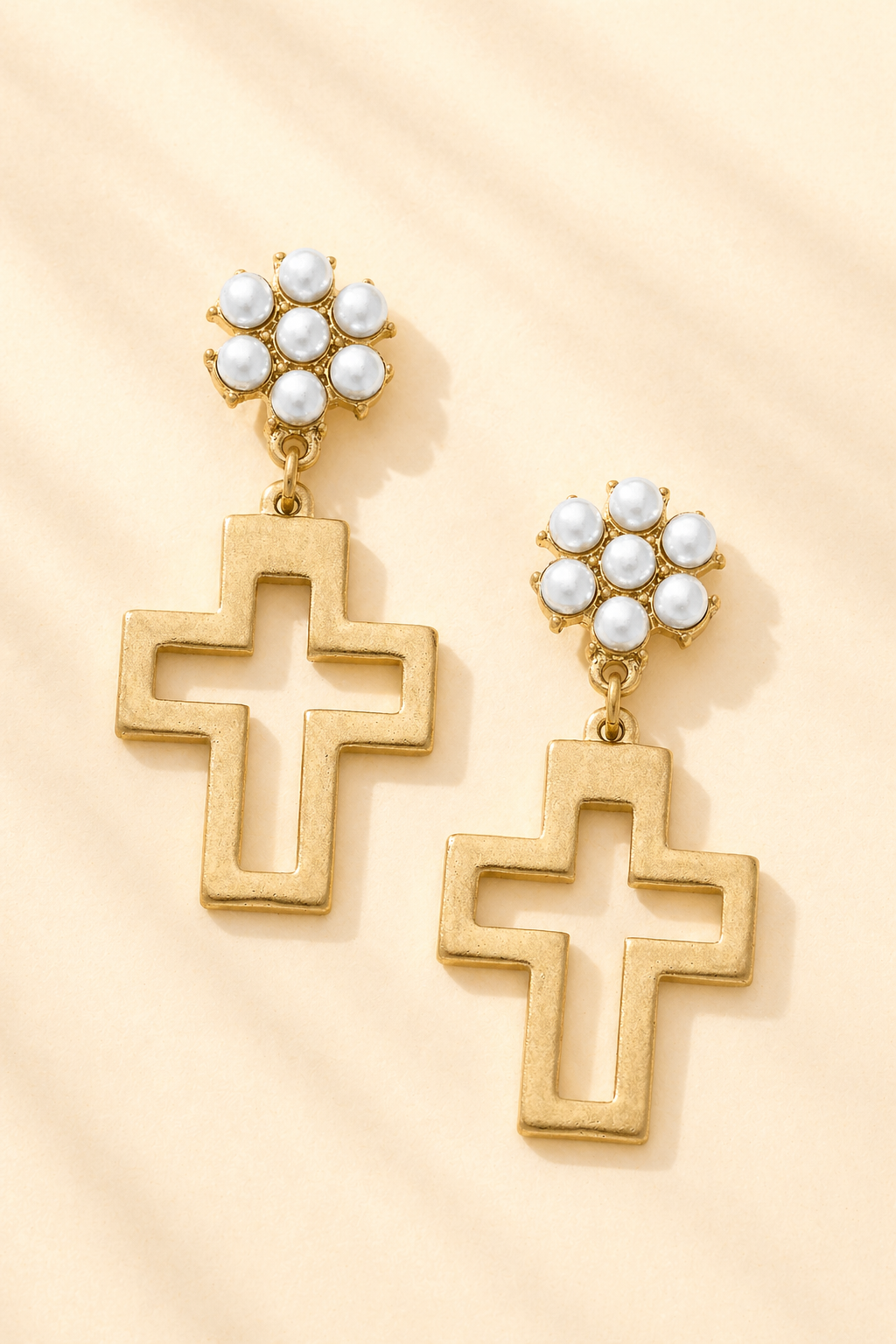 Elegant Pearl Cross Drop Earrings by Canvas Style featuring dangling pearl accents and a delicate cross design in jewelry.