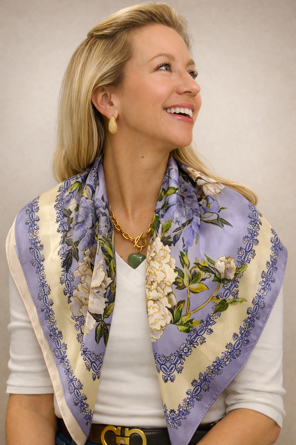 Mulberry silk square scarf featuring a vibrant, intricate pattern, perfect for stylish accessorizing.