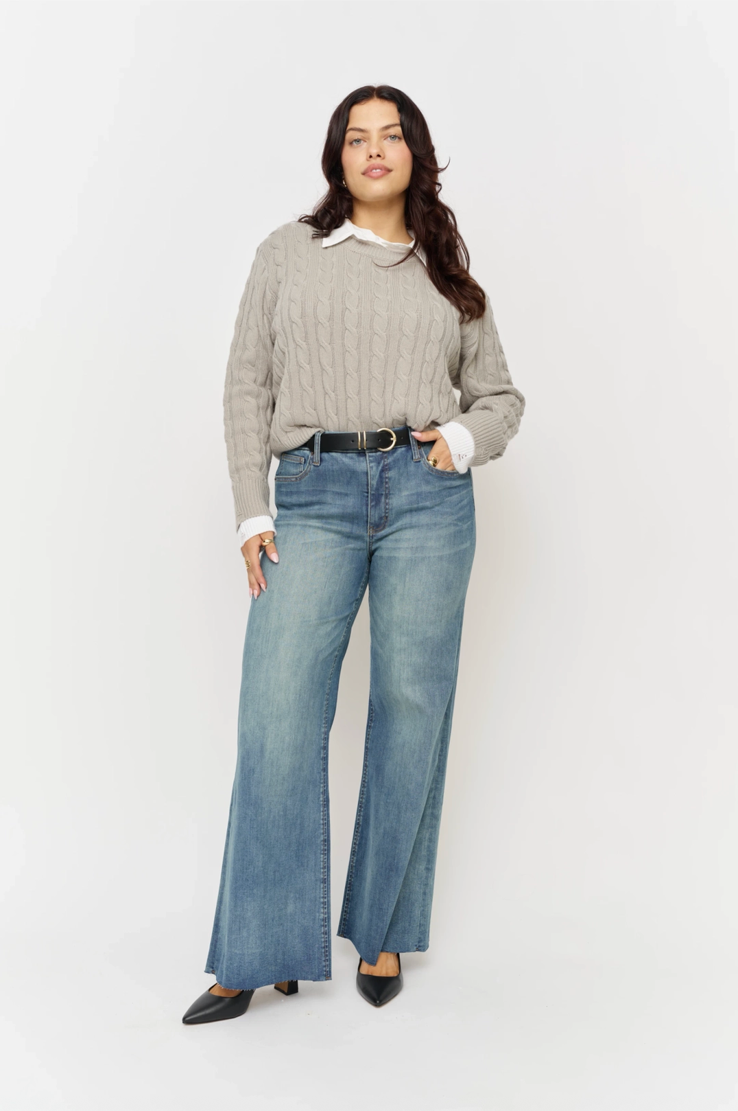 Oliver Logan Crawford mid-rise fitted wide-leg vintage denim bottoms with sculpting and a stylish, relaxed fit.
