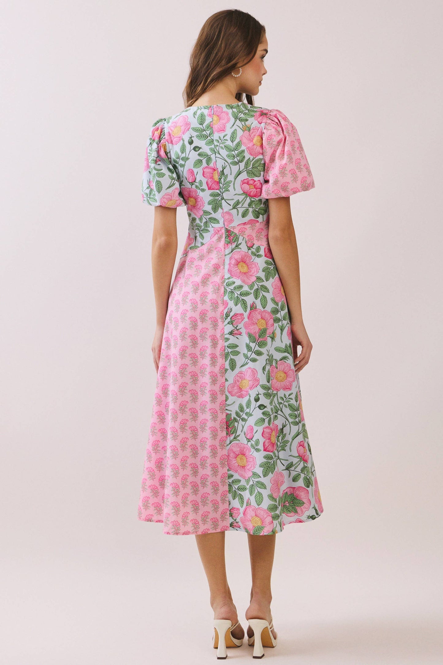 Pink floral Victoria Garden Gala Dress by TCEC with mixed pink and green floral pattern, elegant dress for special occasions.