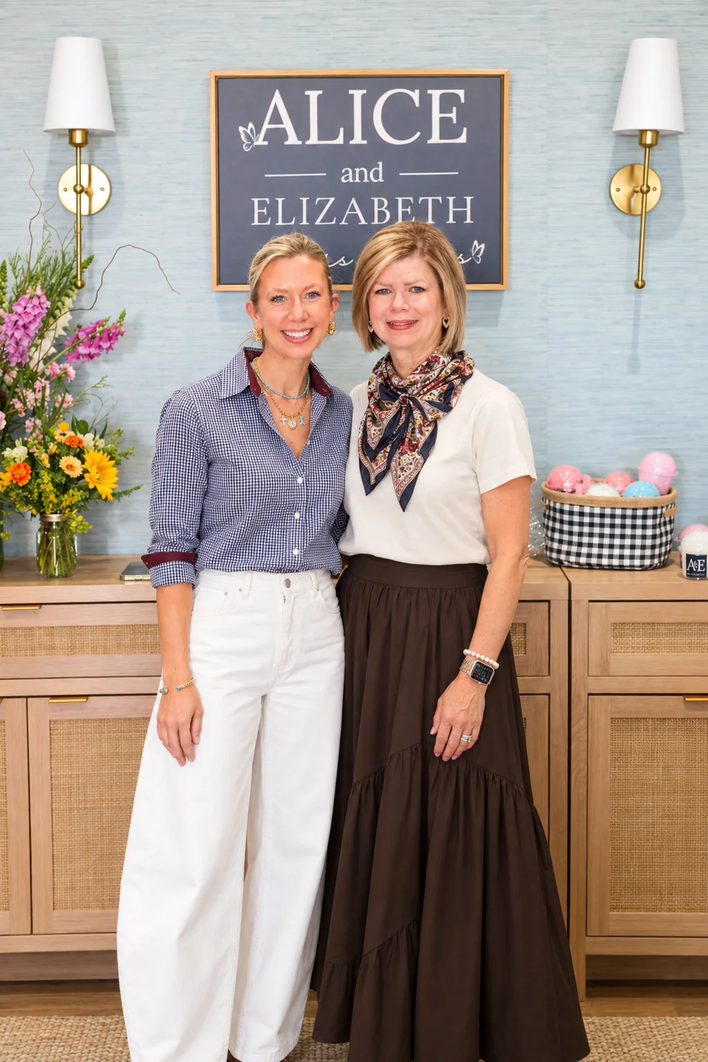 Mia and her mother at Alice & Elizabeth, dressed in navy gingham, ivory and chocolate brown