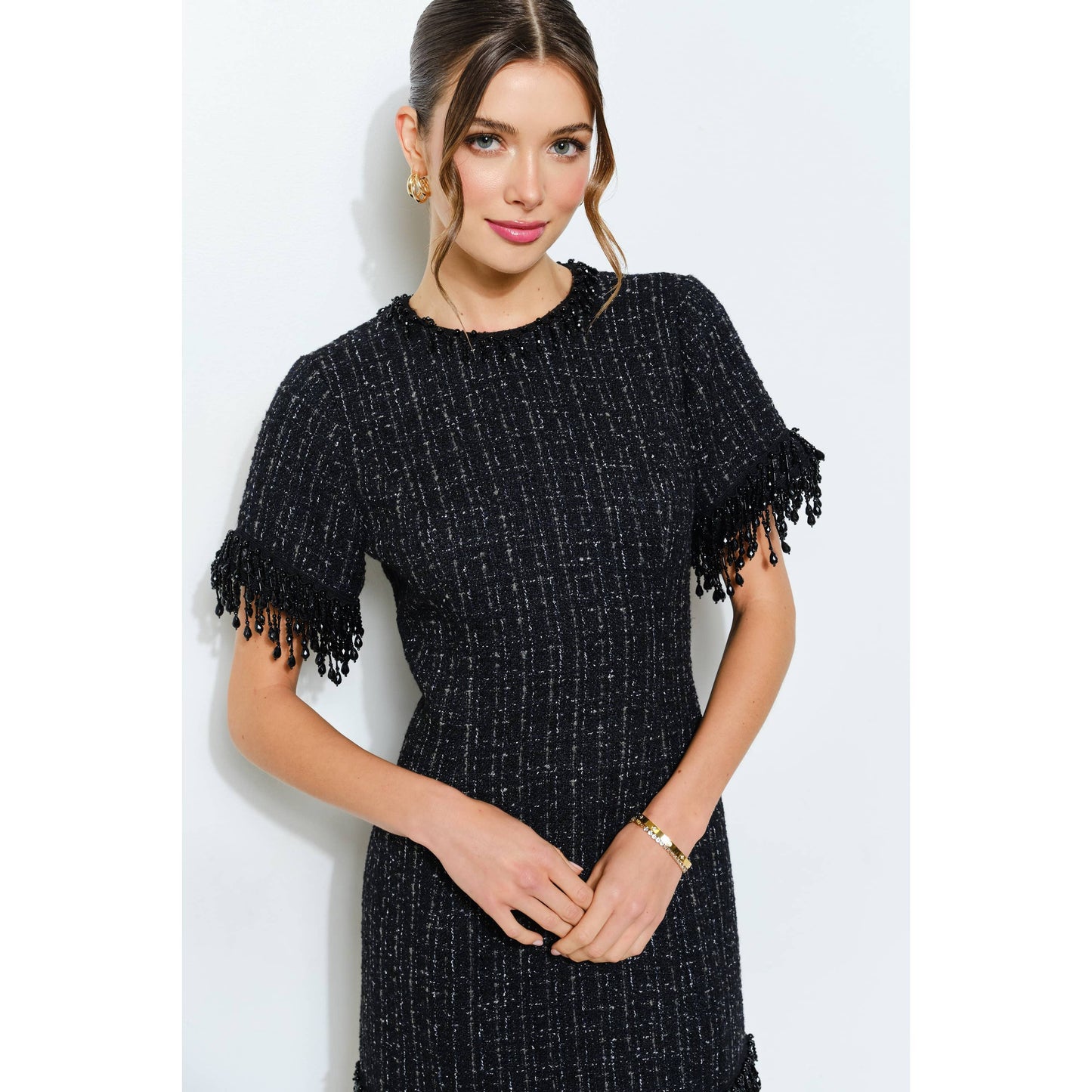INA beaded fringe tweed mini dress with intricate beadwork and fringe details, stylishly displayed on a model.