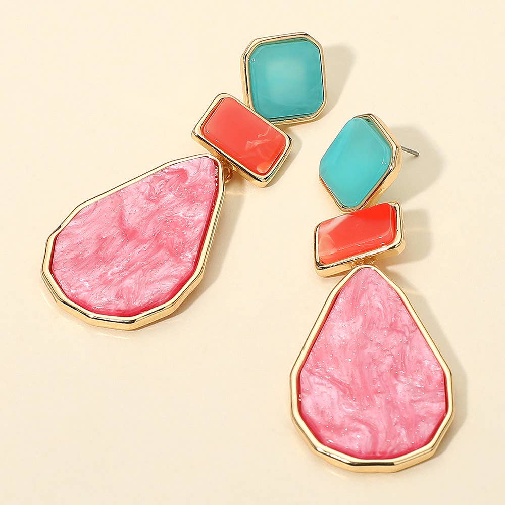 Noelle geometric resin drop earrings by Sensibling Corp., showcasing modern resin jewelry with angular design and vibrant colors.