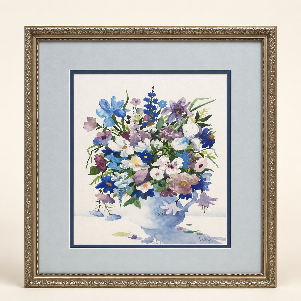 Signed M. Gray wildflower watercolor in decorative frame on an ivory studio background