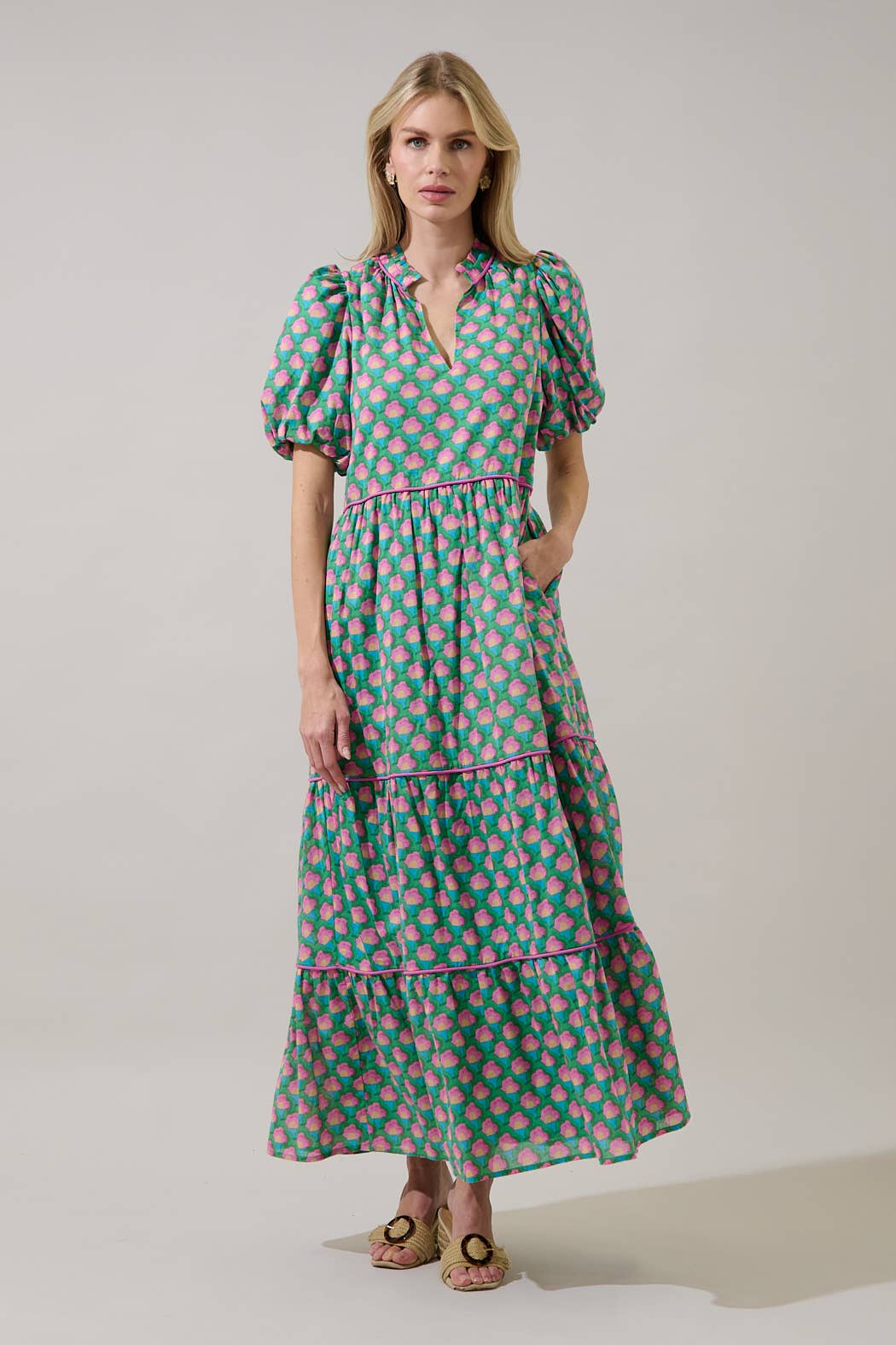 Sugarlips Gercy Renley tiered maxi dress in flowy fabric with layered tiers and sleeveless design, perfect for summer occasions.