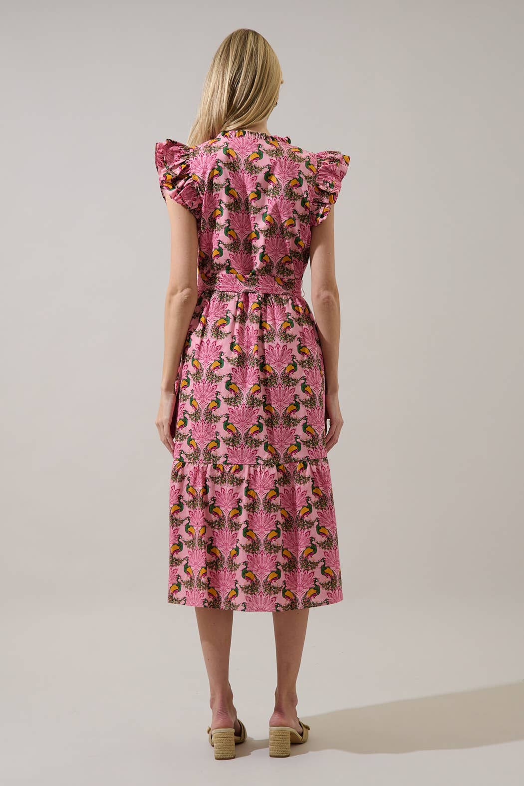 Sugarlips Peacock Bay Sita Ruffle Midi Dress with floral pattern, featuring ruffled sleeves and a flowing silhouette.