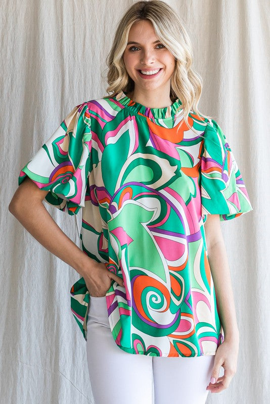 Jodiful Palmer Garden puff sleeve top with floral pattern and ruffled sleeves, stylish and lightweight for casual wear.
