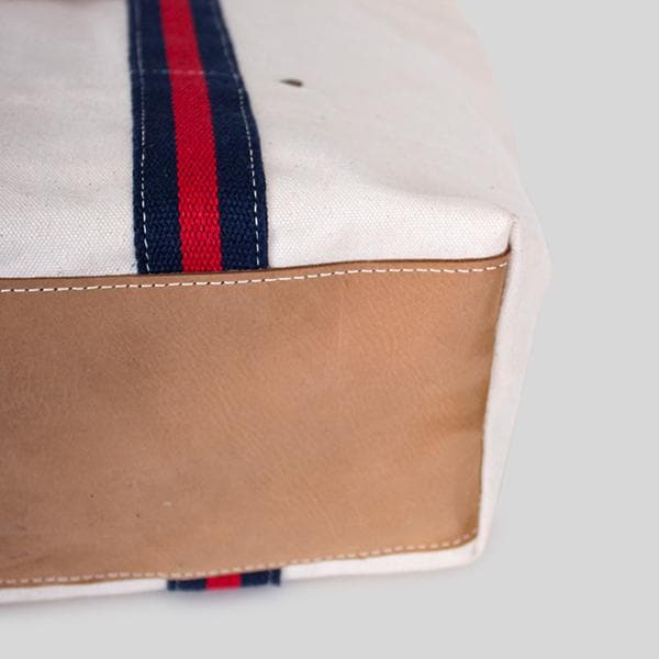 ShoreBags Society Canvas Leather Tote bag with sturdy handles and spacious interior, featuring a stylish design and natural leather accents.