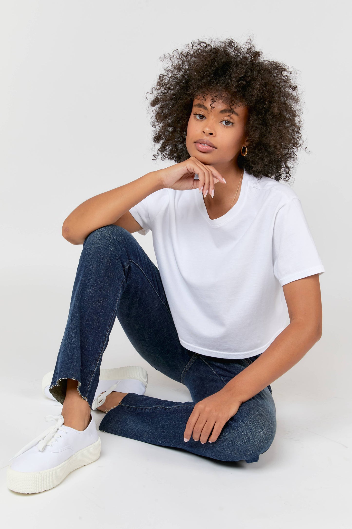Oliver Logan Crosby Mid Rise Relaxed Taper Jean in standard wash, showcasing the casual denim bottoms with a relaxed fit.