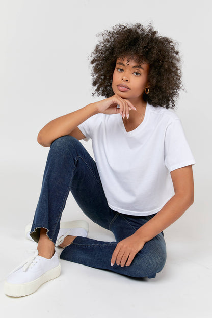 Oliver Logan Crosby Mid Rise Relaxed Taper Jean in standard wash, showcasing the casual denim bottoms with a relaxed fit.