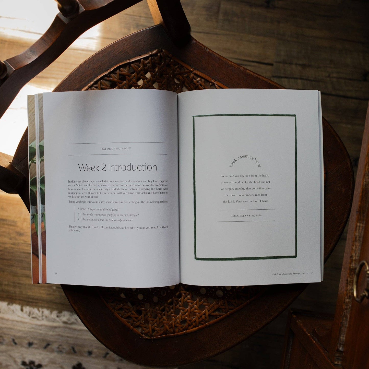 Open copy of The Daily Grace Co Fresh Start Devotional with colorful cover and pages visible.
