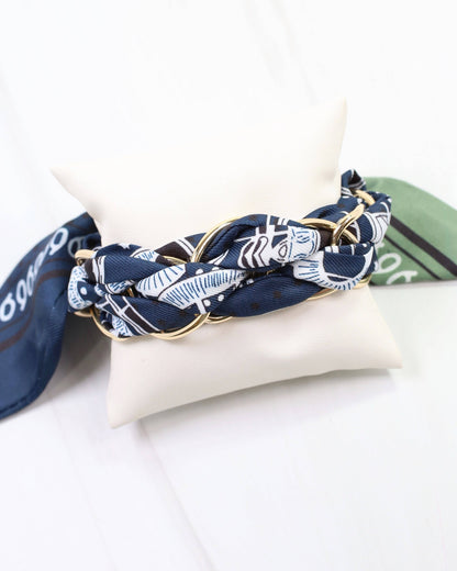 Caroline Hill Navy Silk Twist Chain Scarf Bracelet featuring a stylish, elegant scarf design with a chain detail for a sophisticated look.