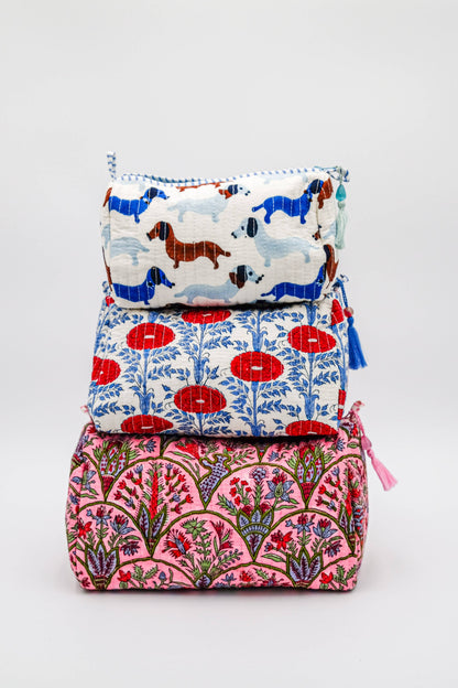 Inner Child Araminta Bloom medium toiletry bag with floral pattern and zipper closure, designed for travel and organization.