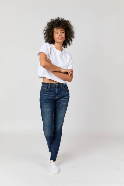 Oliver Logan Crosby Mid Rise Relaxed Taper Jean in standard wash, showcasing the casual denim bottoms with a relaxed fit.