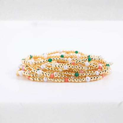 Splendid Iris Carolina Pearl Stack Bracelet showing layered pearl and silver jewelry on a neutral background.