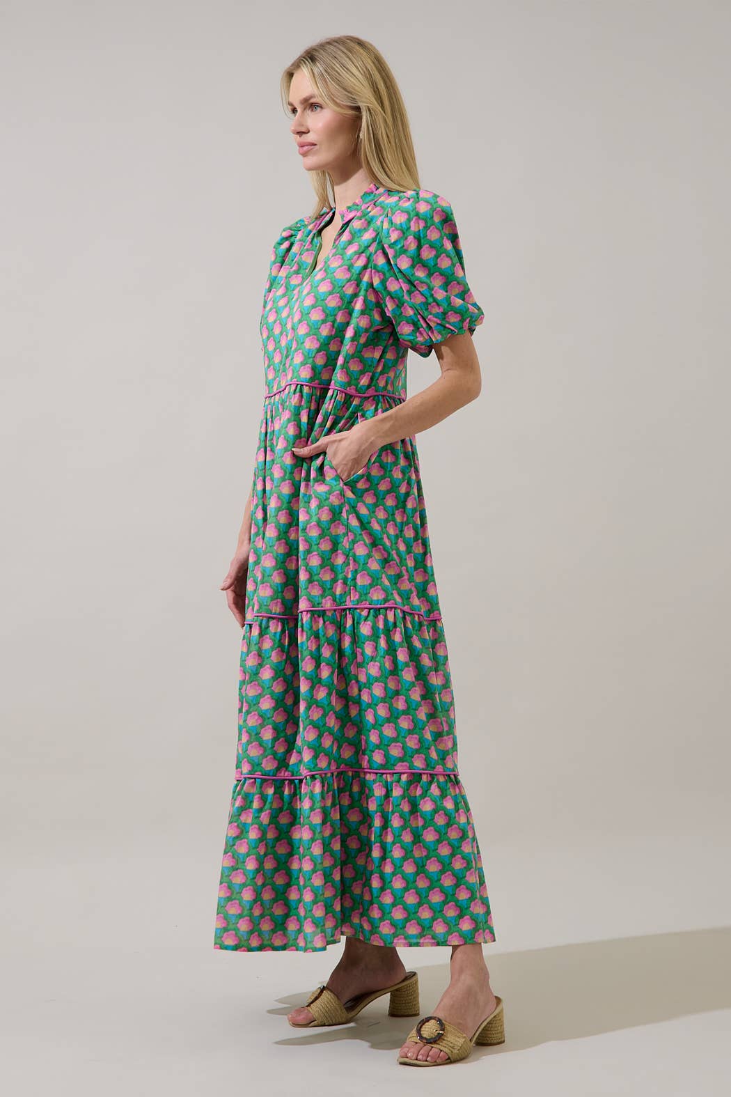 Sugarlips Gercy Renley tiered maxi dress with flowing fabric, sleeveless design, and floral pattern perfect for summer wear.