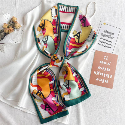 Narrow long silk scarf featuring double-sided design, stylish accessory from UZ Wholesale Store, displayed flat with intricate fabric details.