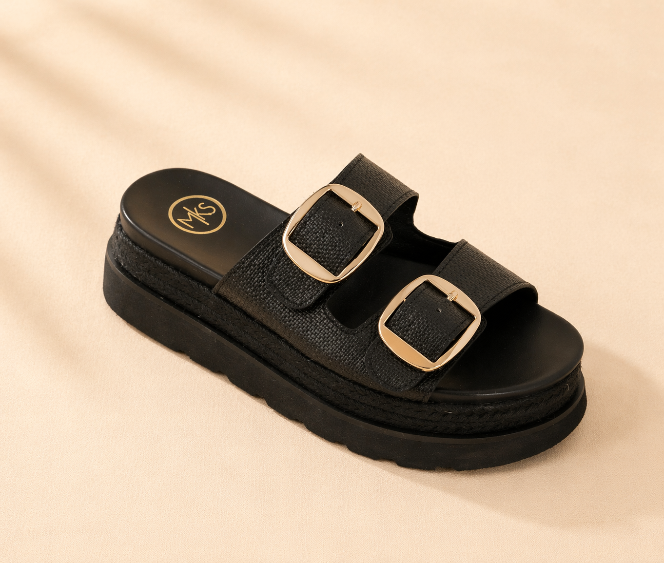 Black Monique wedges by Maker's Shoes featuring gold accents, stylish slide sandal with a comfortable wedge heel.