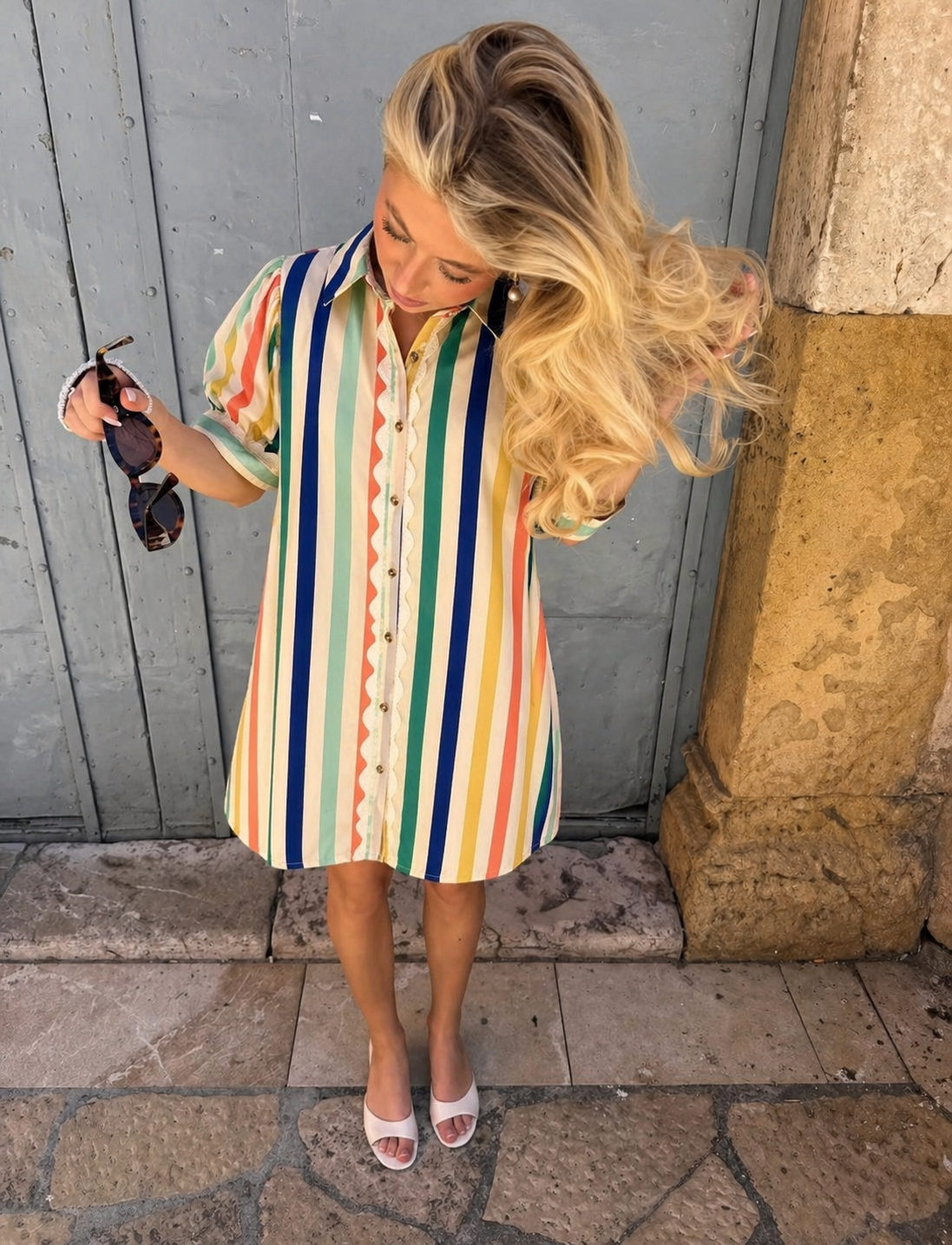 Jodiful Caroline Riviera Stripe Shirt Dress shown on a model, featuring a relaxed fit with blue and white horizontal stripes.