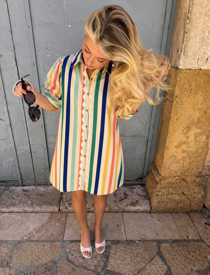 Jodiful Caroline Riviera Stripe Shirt Dress shown on a model, featuring a relaxed fit with blue and white horizontal stripes.