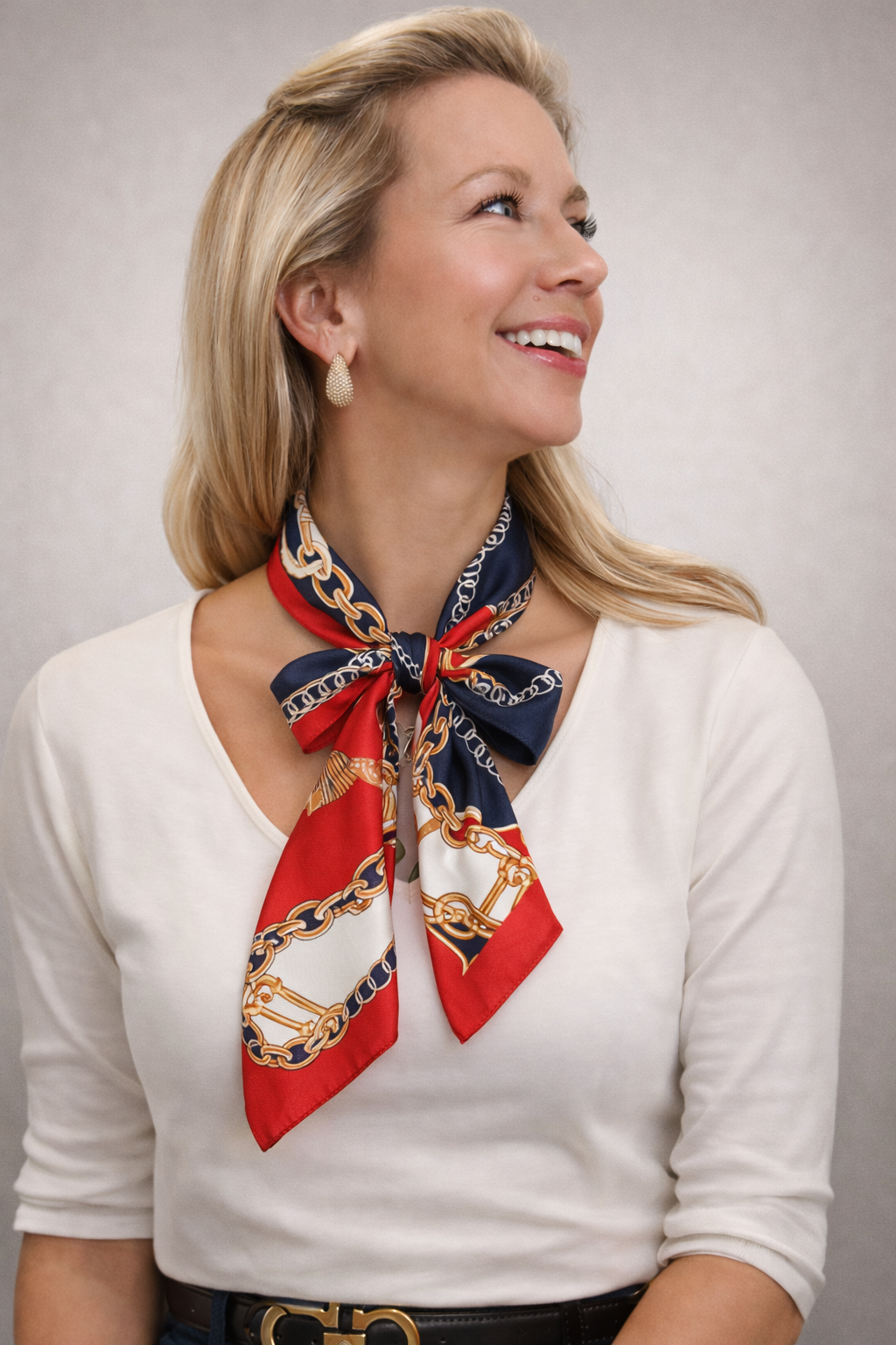 Narrow double-sided silk scarf with long, flowing design in vibrant colors, perfect for stylish accessory wear.