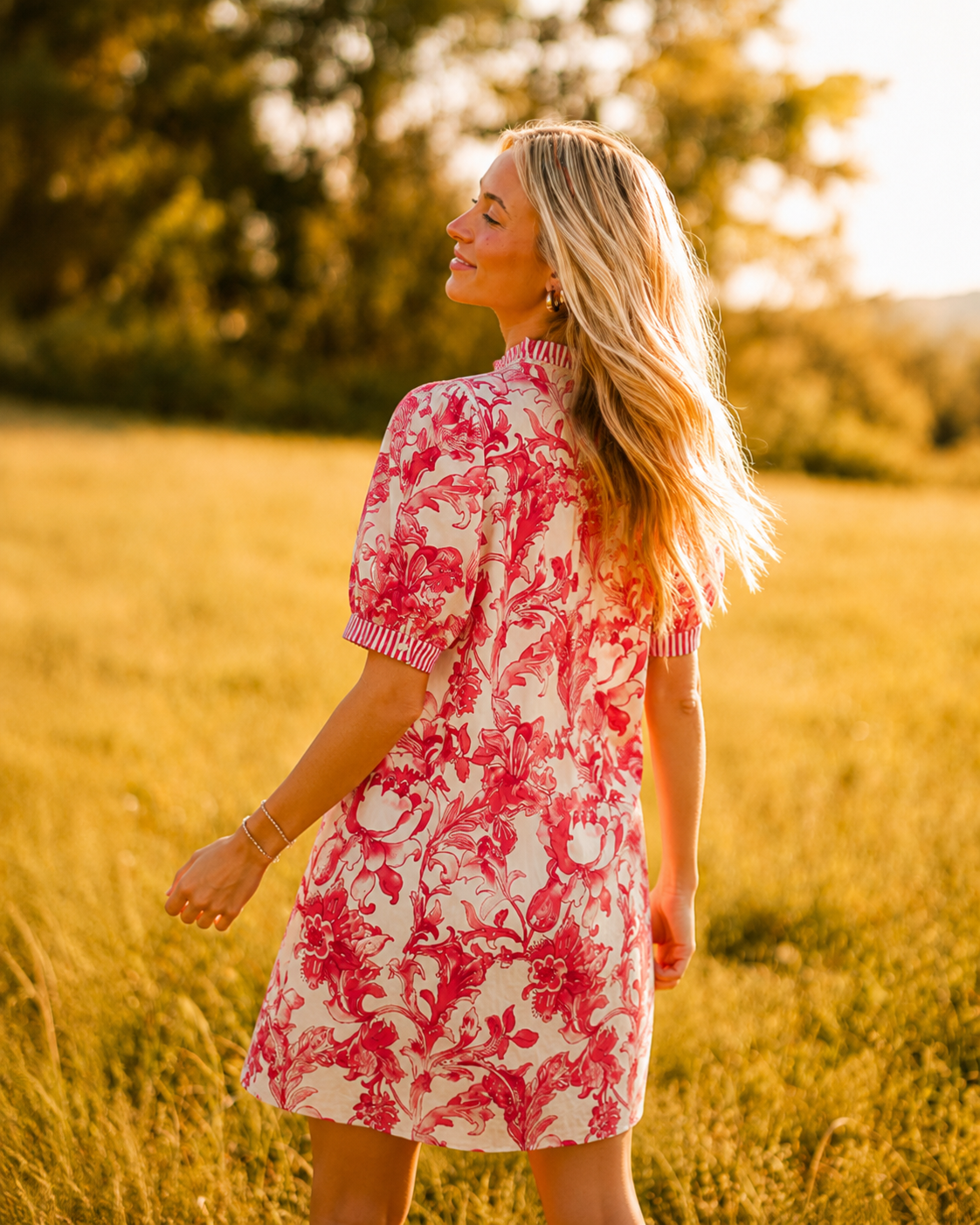 Red floral stripe puff sleeve dress by Jodiful with a fitted bodice, ruffle accents, and a flowy skirt.