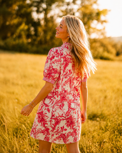 Red floral stripe puff sleeve dress by Jodiful with a fitted bodice, ruffle accents, and a flowy skirt.