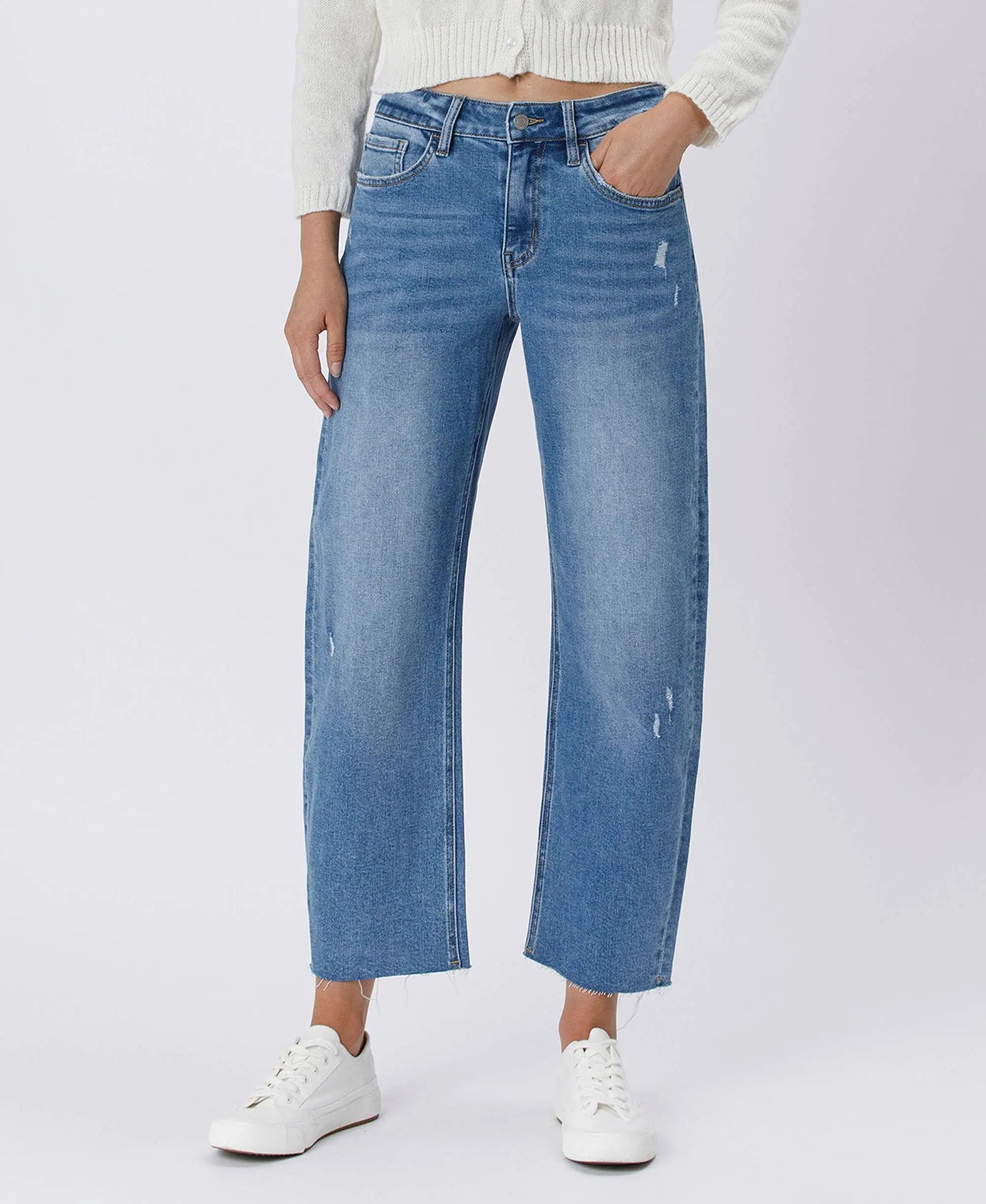 Lovervet by VERVET high-rise mild barrel jeans in denim, showing the fit and style of the trendy bottoms.