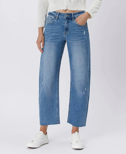 Lovervet by VERVET high-rise mild barrel jeans in denim, showing the fit and style of the trendy bottoms.
