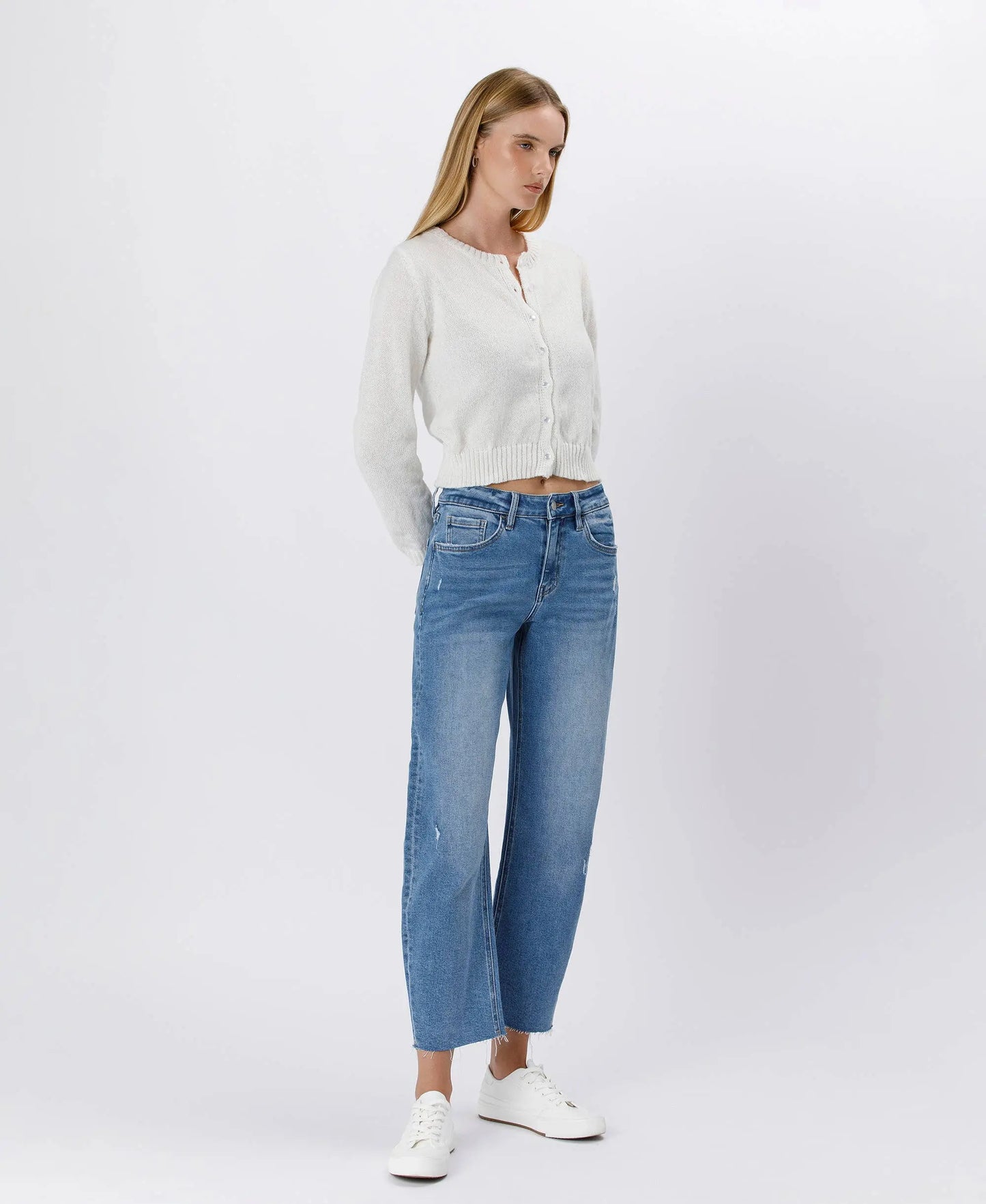 Lovervet by VERVET high-rise mild barrel jeans in denim, showcasing fit and style with visible pockets and stitching.