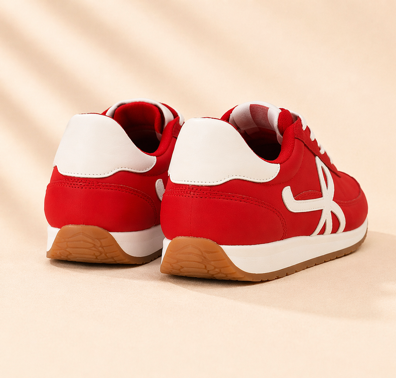 Red and white CCOCCI Scarlett Court sneaker showcasing a minimalist design with a sleek silhouette and comfortable fit.