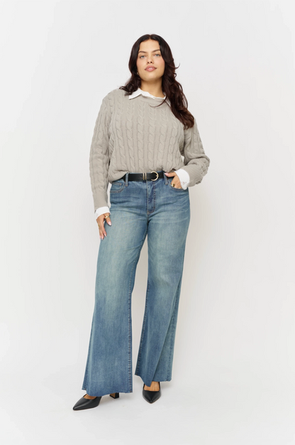 Oliver Logan Crawford mid-rise fitted wide-leg vintage denim bottoms with sculpting and a stylish, relaxed fit.