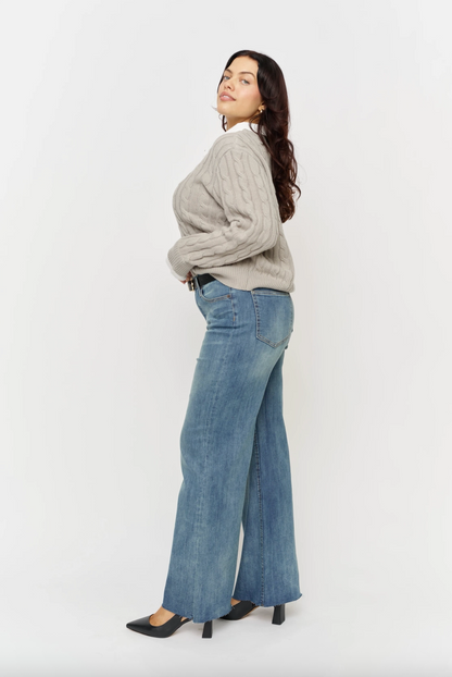 Oliver Logan Crawford vintage denim bottoms with mid-rise fit and wide-leg, sculpted for a stylish, fitted look.