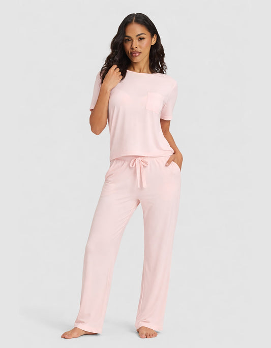 Women's bamboo stretch-knit lounge tee and pants set by Cozy Earth, featuring a short-sleeve top and relaxed pants in blossom color.