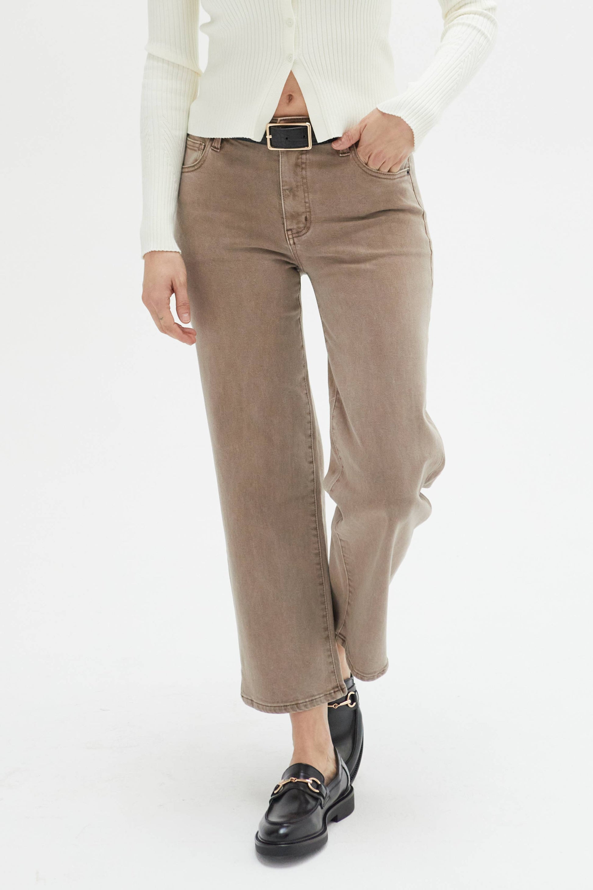 Oliver Logan Addington ankle crop mid-rise jean in brown mix, showing the fitted bottoms with distressed details and rolled cuffs.