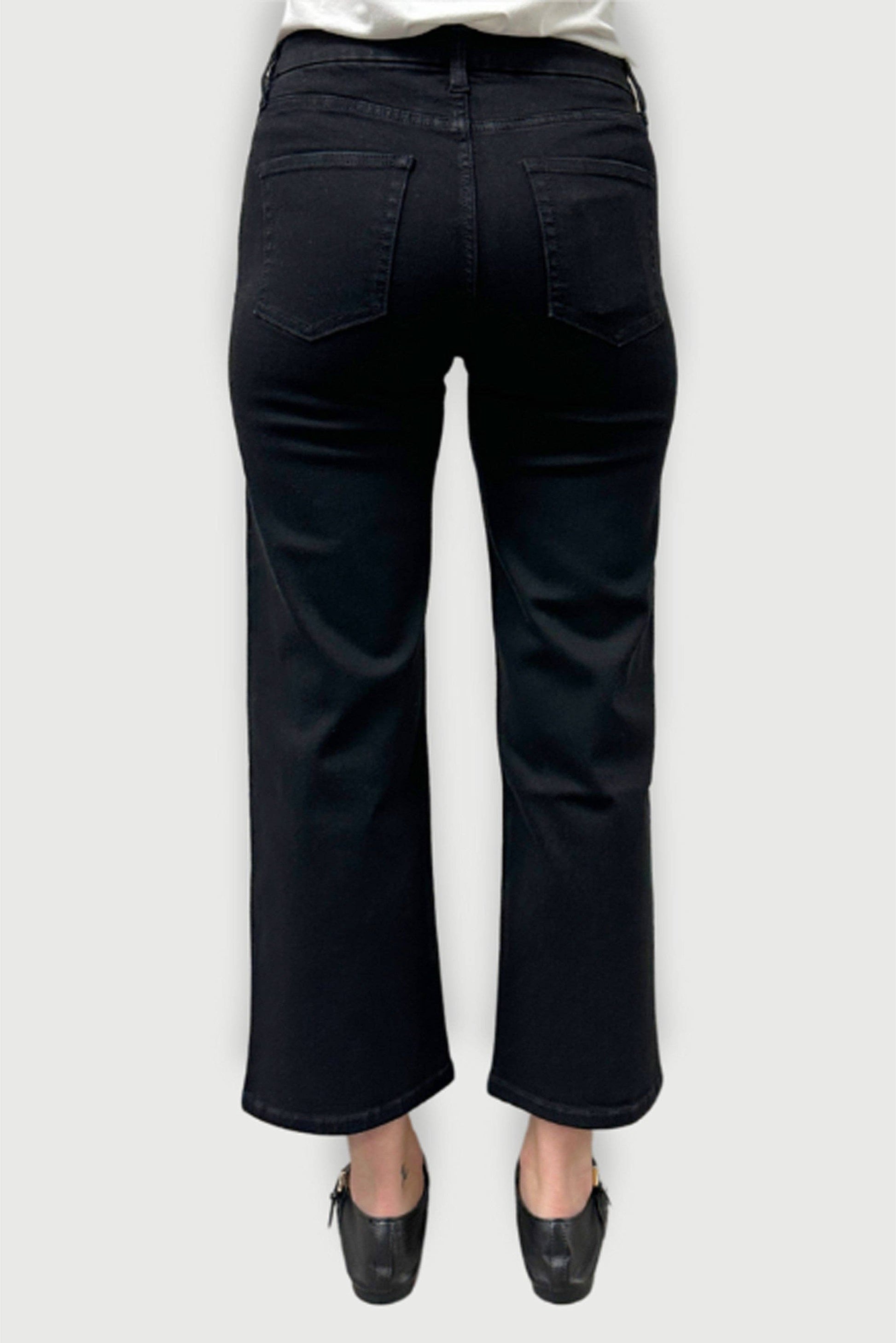 Oliver Logan Addington mid rise wide leg crop jeans in jet black, shown as stylish bottoms with a relaxed fit and cropped length.