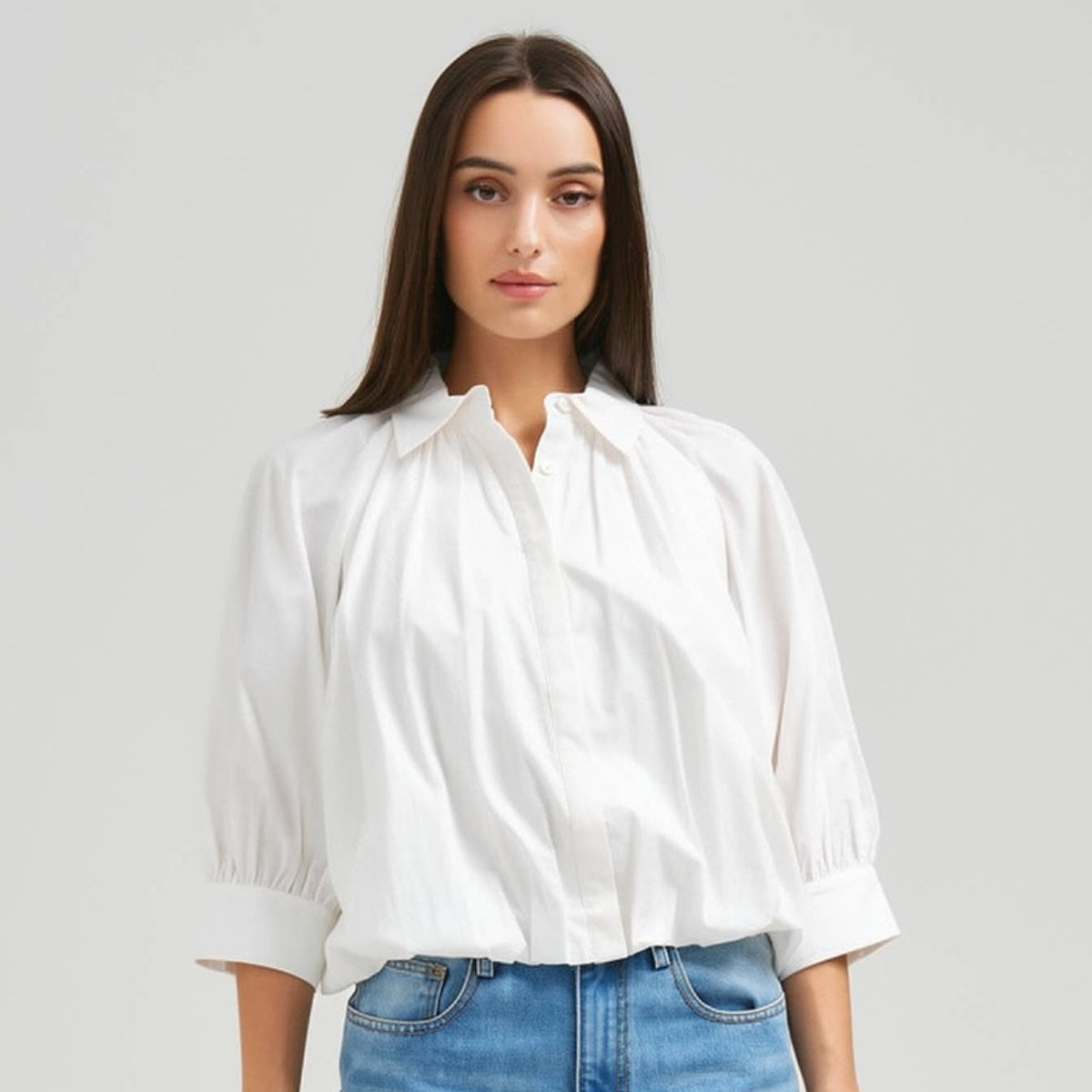 Able ivory 3/4 sleeve bubble hem blouse with relaxed silhouette