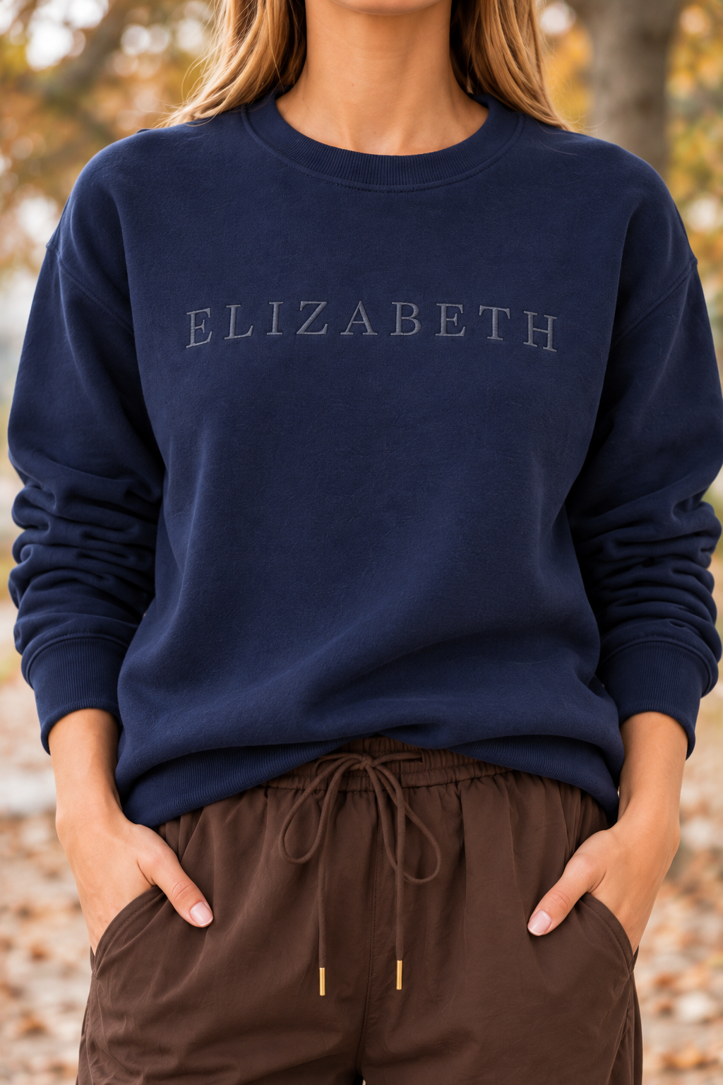ELIZABETH navy sweatshirt, front lettering and fabric detail