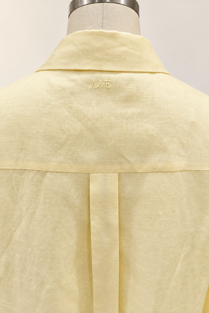 Alice & Elizabeth butter yellow linen dress — tonal A&E embroidery below the back collar
