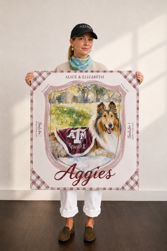 Woman holding the Aggies mahjong mat