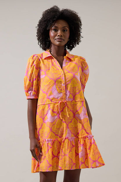 Sugarlips Jaidy Stacie button-down mini dress in fabric, featuring a stylish design with collar and long sleeves, shown in image.