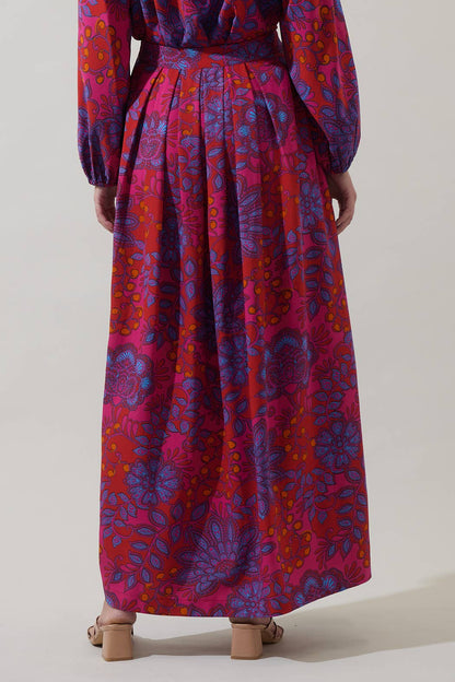 Sugarlips Darret Floral Lucie pleated maxi skirt in vibrant fuchsia multi, showcasing flowing fabric and colorful floral pattern.