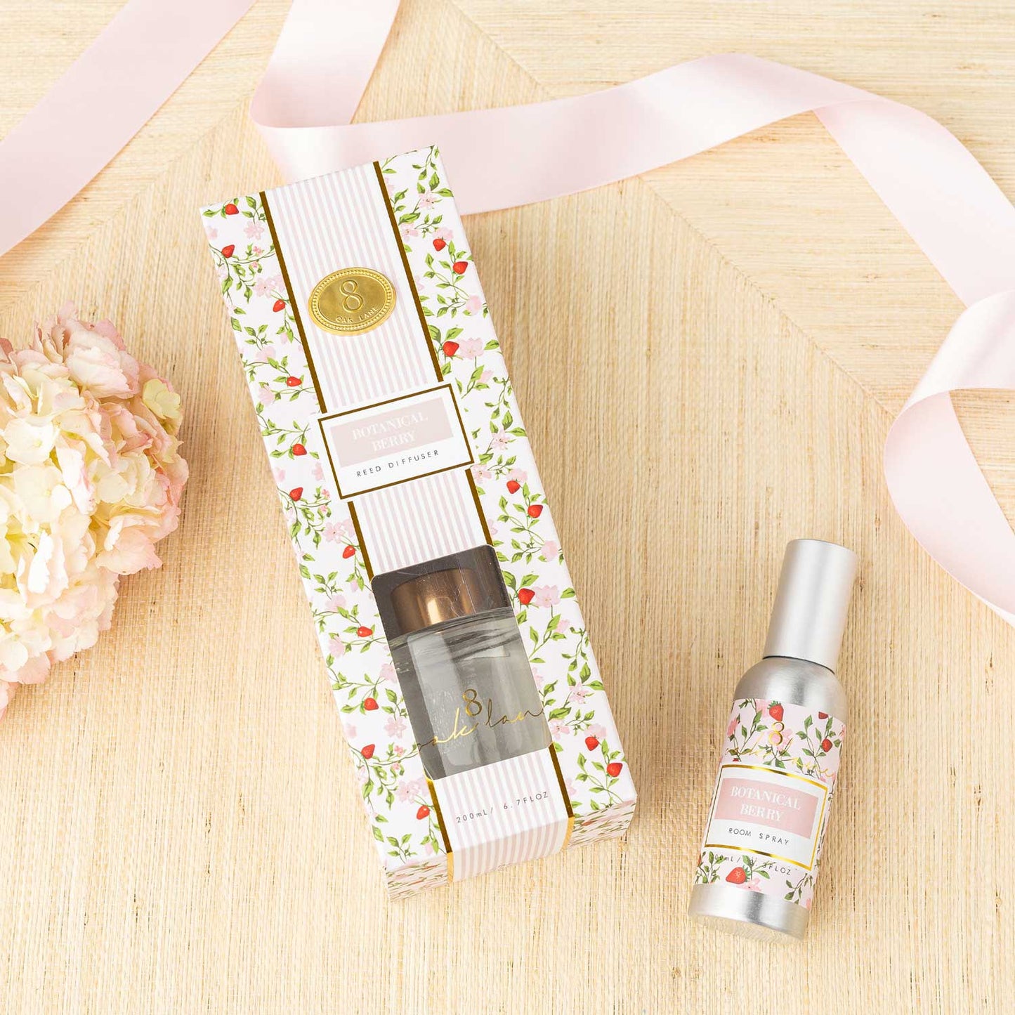 Botanical Berry room spray by 8 Oak Lane, a floral fragrance with berry notes, displayed in a clear glass bottle.