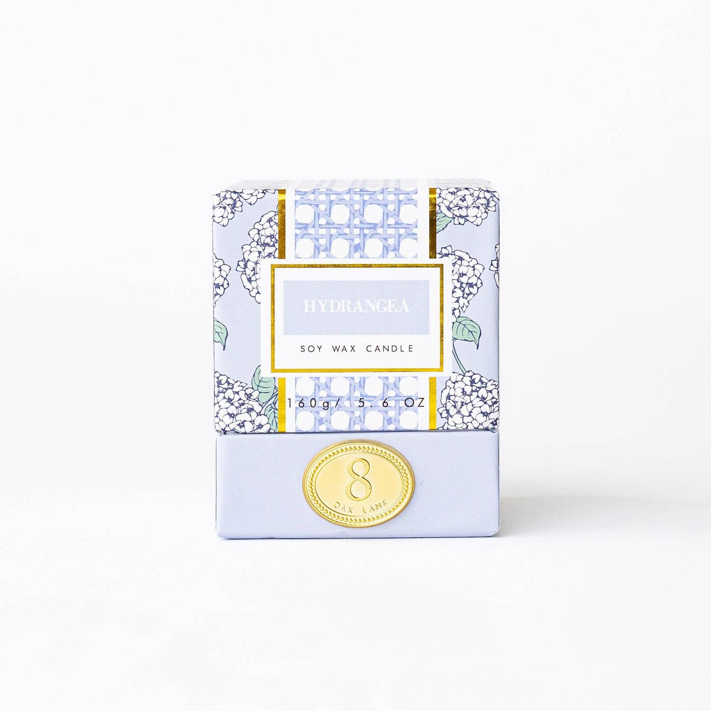 Lillian Hydrangea Candle by 8 Oak Lane featuring a floral hydrangea design in a glass holder, perfect for home decor and ambiance.