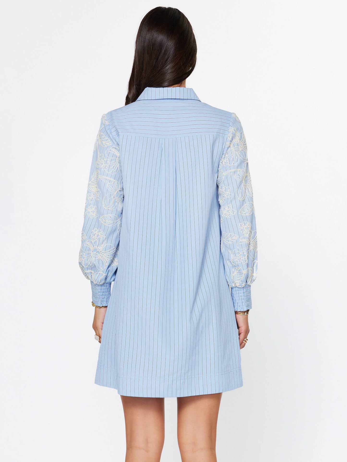 Current Air Eloise embroidered Misty Blue dress with floral details, flowing fabric, and elegant design for special occasions.
